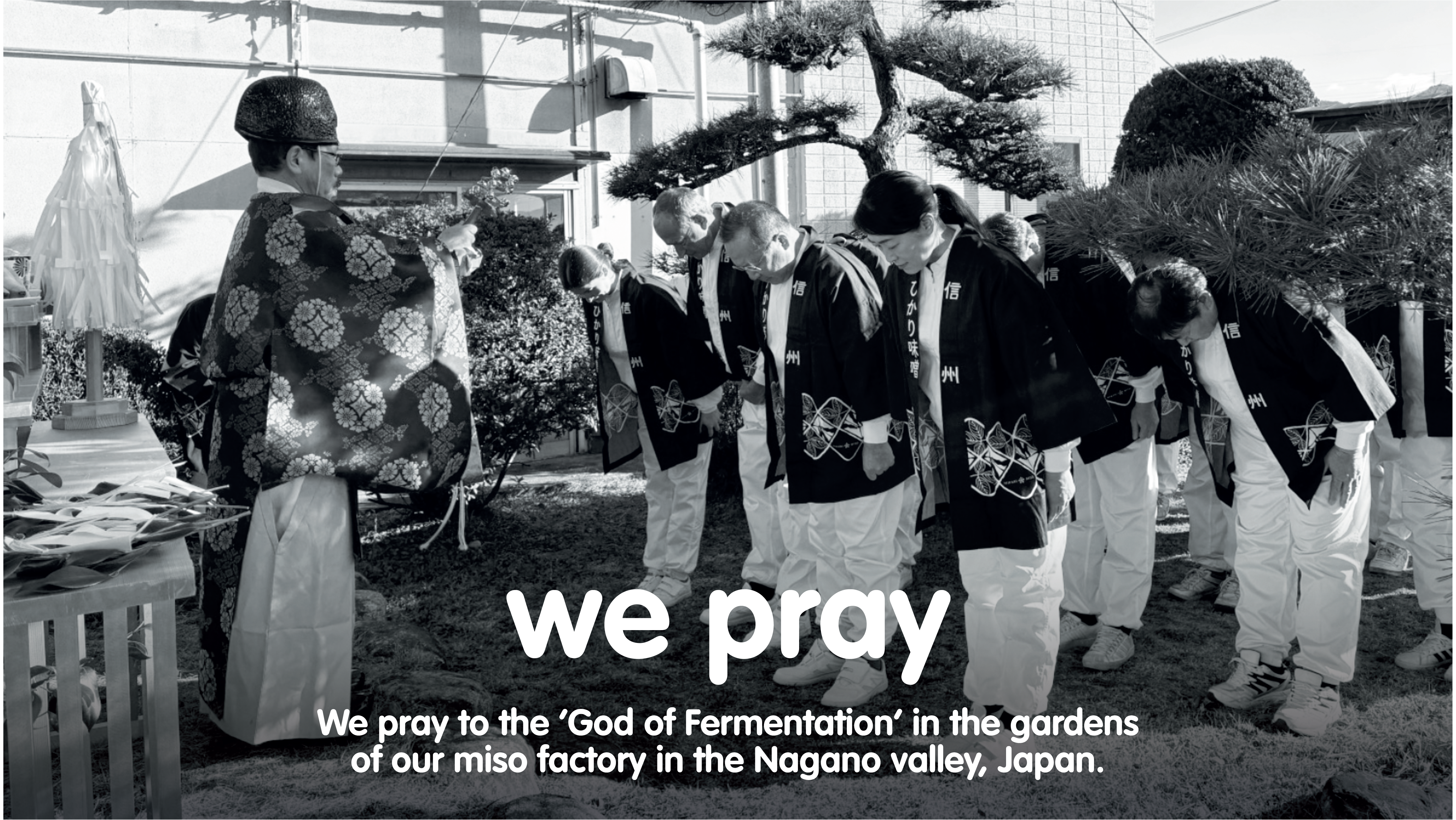 Japanese men bow during a fermentation prayer ceremony at a Nagano miso factory.
