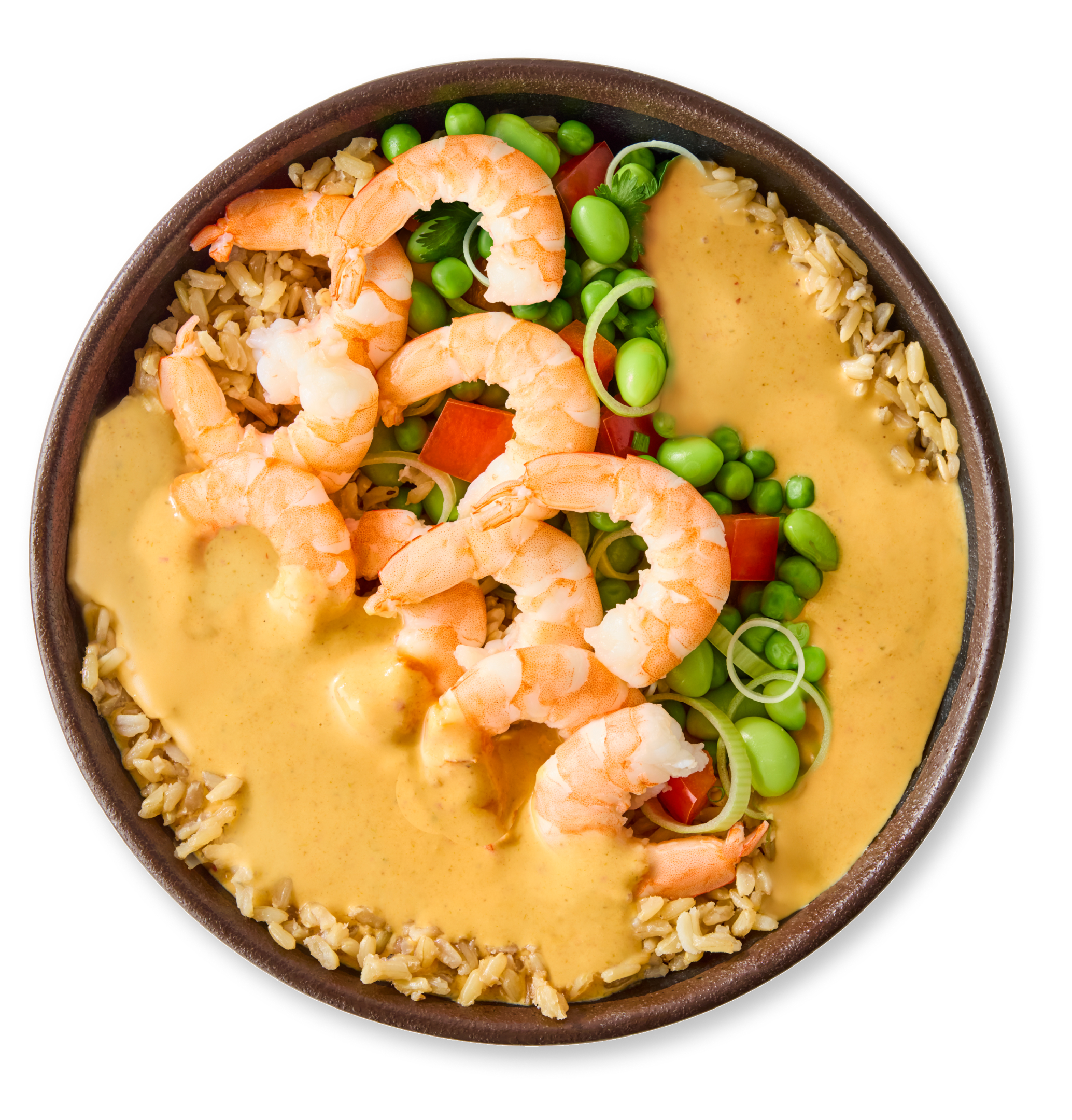 A bowl of brown rice topped with curry, shrimp, edamame, and sliced scallions.