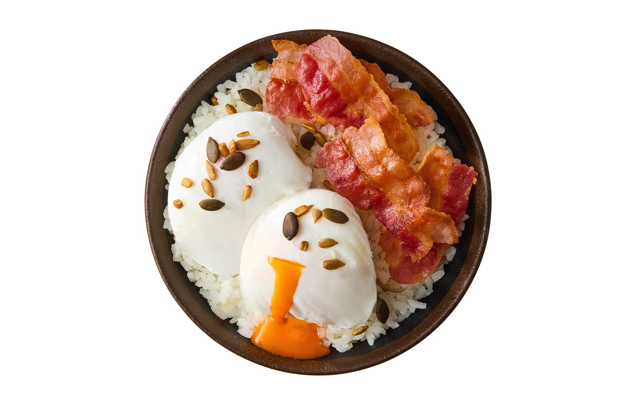 A bowl of white rice topped with poached eggs, crispy bacon, and sprinkled seeds.