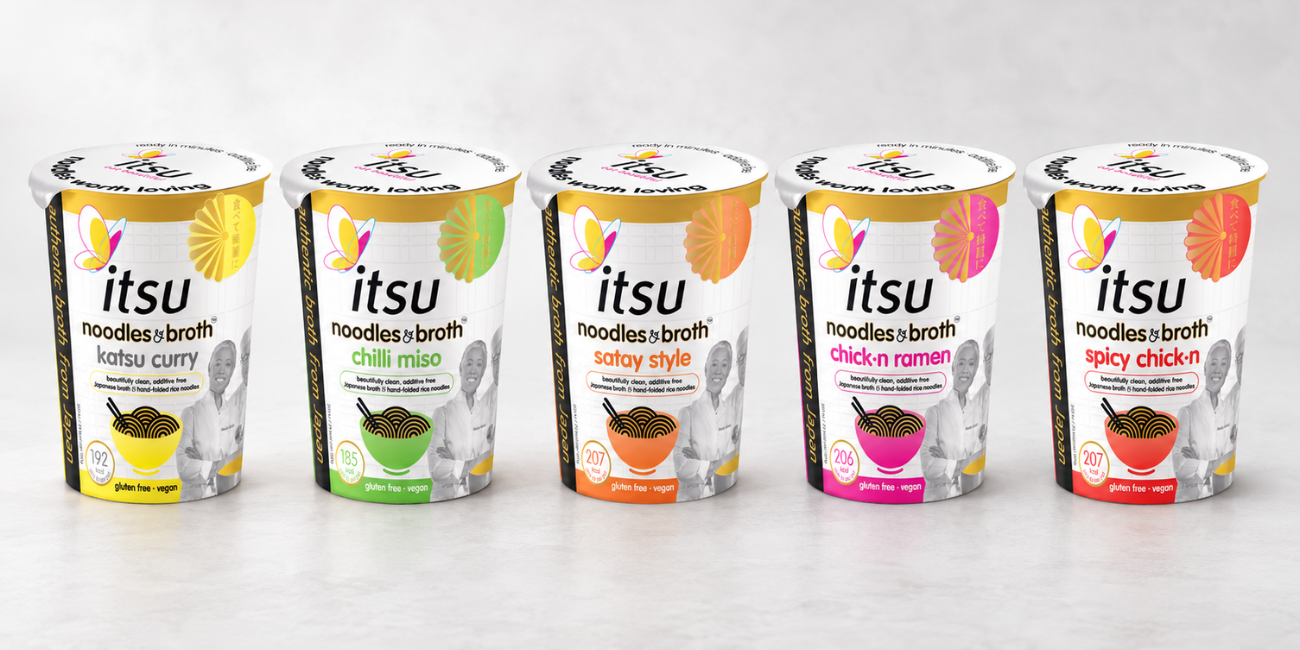 Five itsu noodles + broth cups in various flavors lined up on a surface.