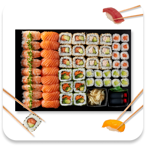 Large sushi platter with salmon sashimi, various maki rolls, and nigiri, ready to eat.