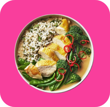 Sliced chicken breast, broccoli, snap peas, and wild rice in a bowl with sauce.