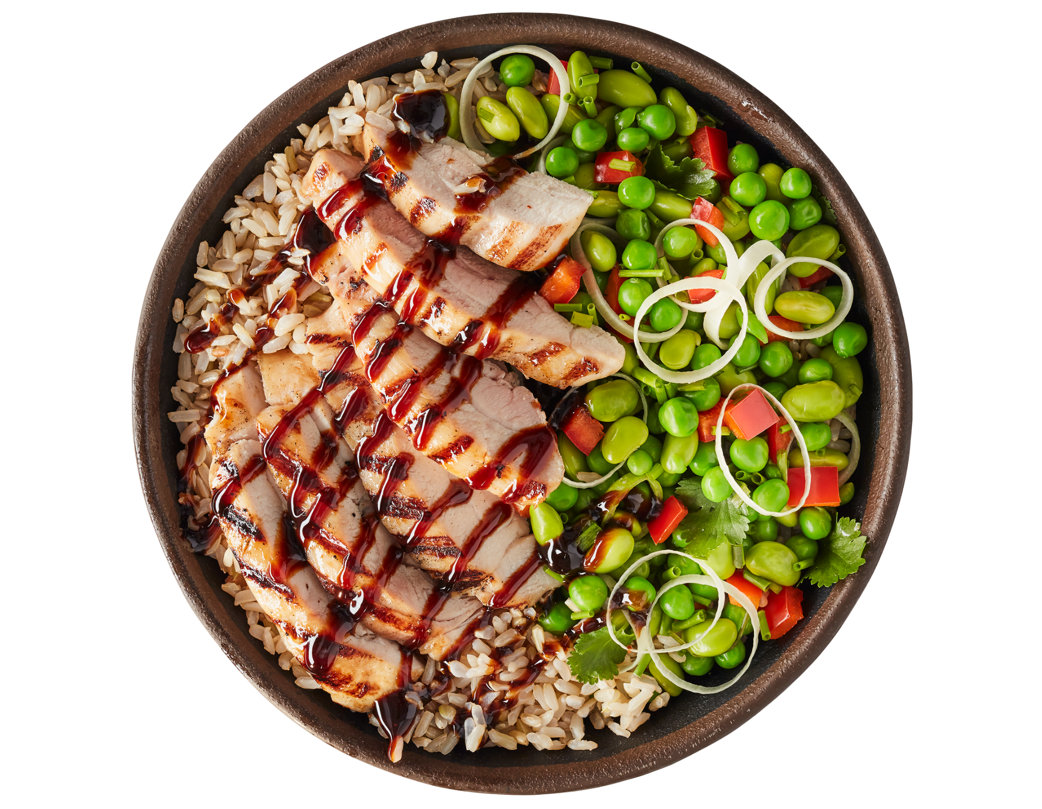 Grilled chicken, brown rice, and vegetable bowl with peas, edamame, and peppers.