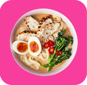 Overhead view of a ramen bowl with noodles, grilled chicken, soft-boiled egg, and broccoli.
