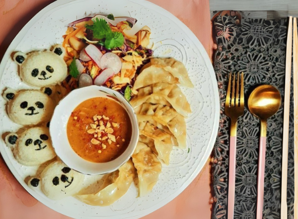 gyoza with peanut slaw and rice (1).png