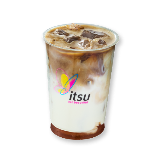 Iced coffee latte with distinct layers of dark coffee, milk, and ice in a clear Itsu cup.