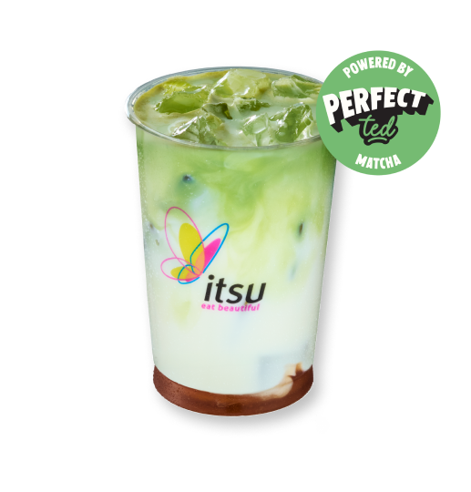 Layered matcha latte with ice in an Itsu cup, powered by Perfect Matcha.