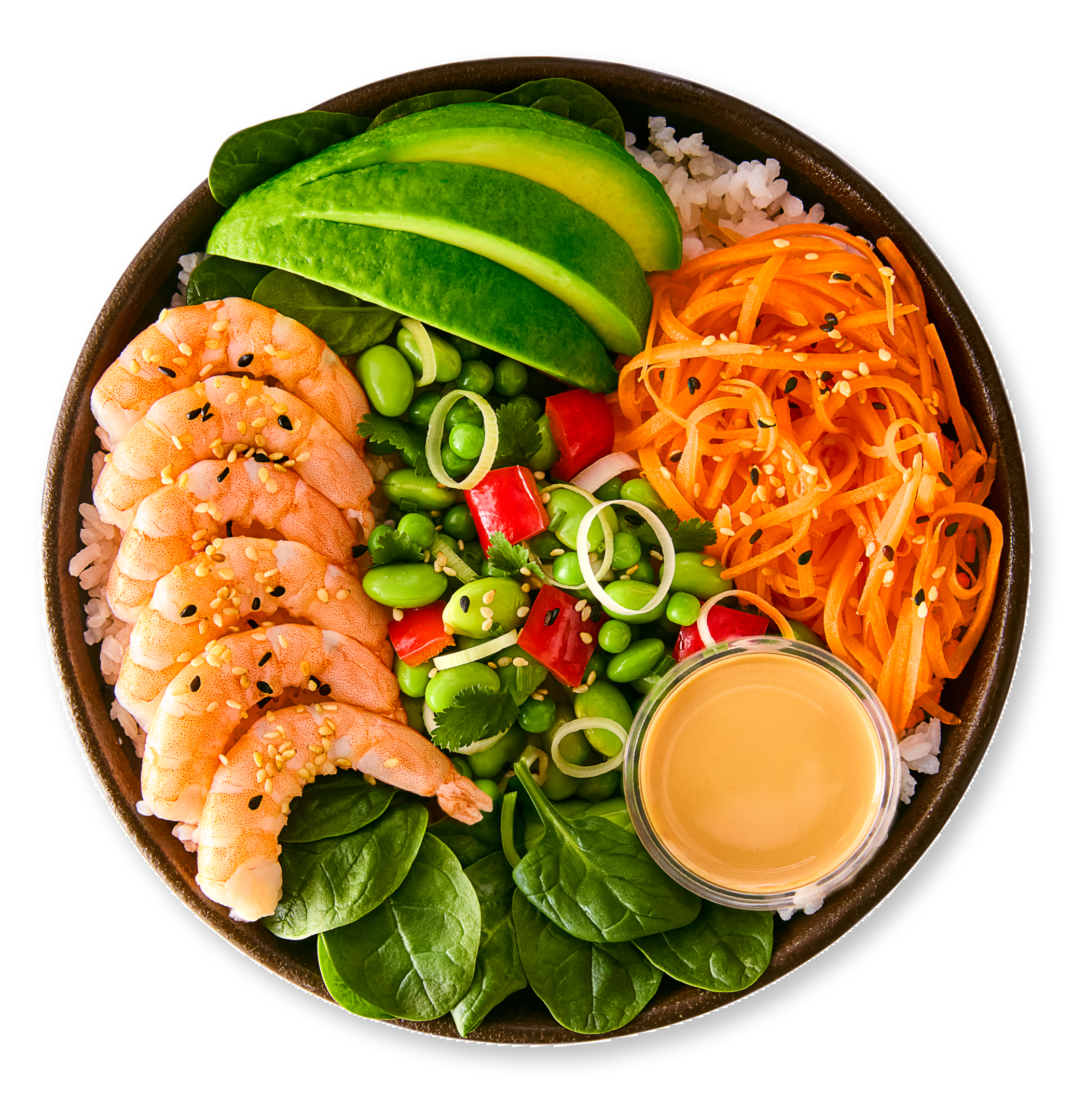 A poke bowl with rice, shrimp, avocado, edamame, and shredded carrots with a side of sauce.