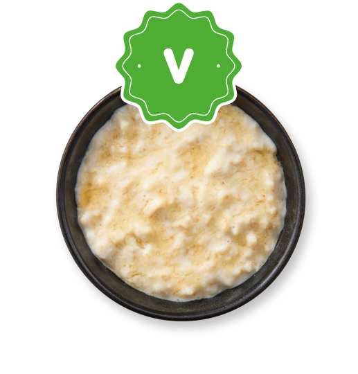 Creamy porridge or oatmeal in a dark bowl with a prominent green 'V' badge.