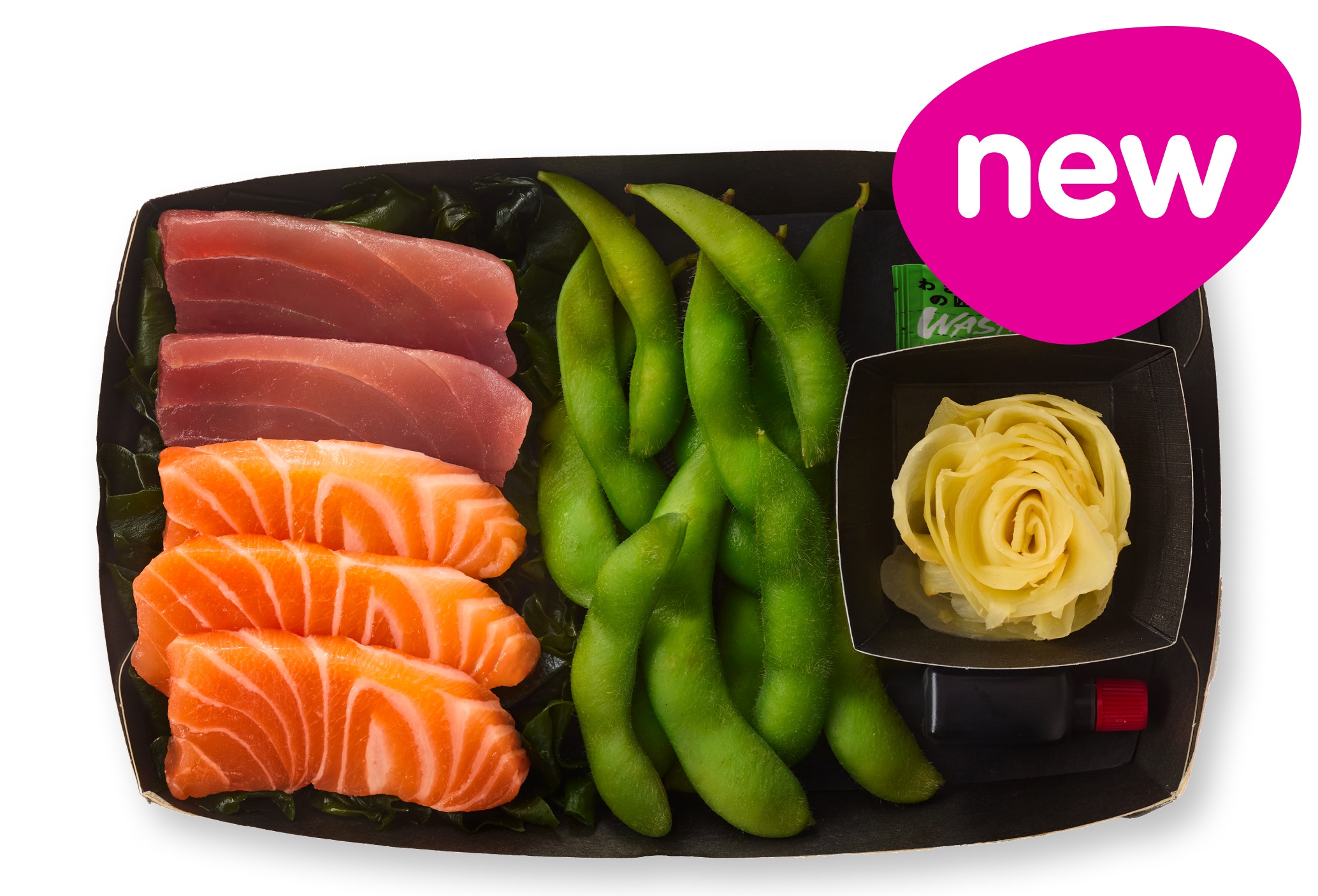 Sashimi tray with tuna, salmon, edamame, and pickled ginger.