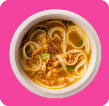 Flat noodles in golden broth, topped with fried garlic and green onions.