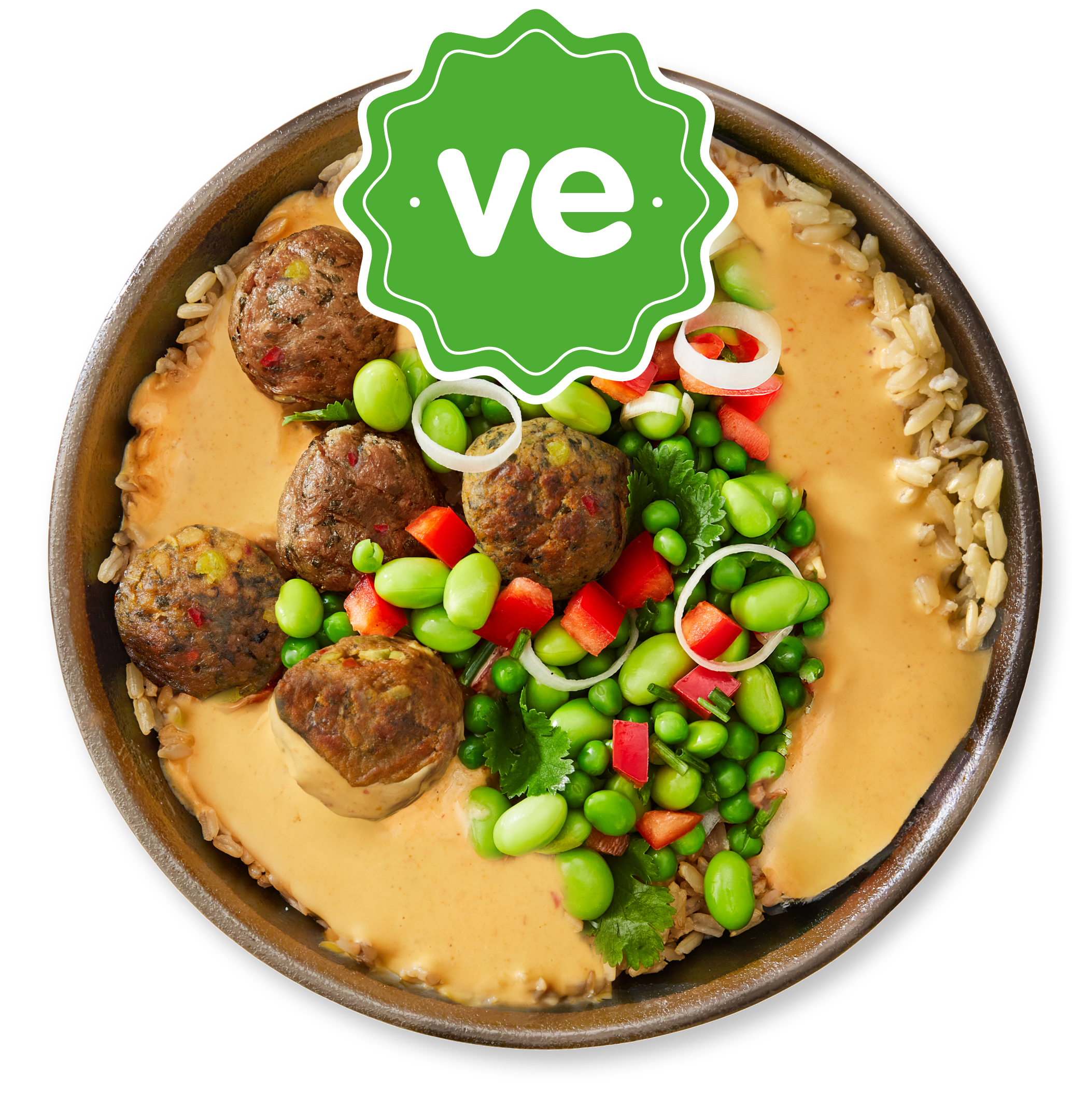 Hearty vegan bowl with plant-based meatballs, creamy hummus, edamame, peas, and red peppers.