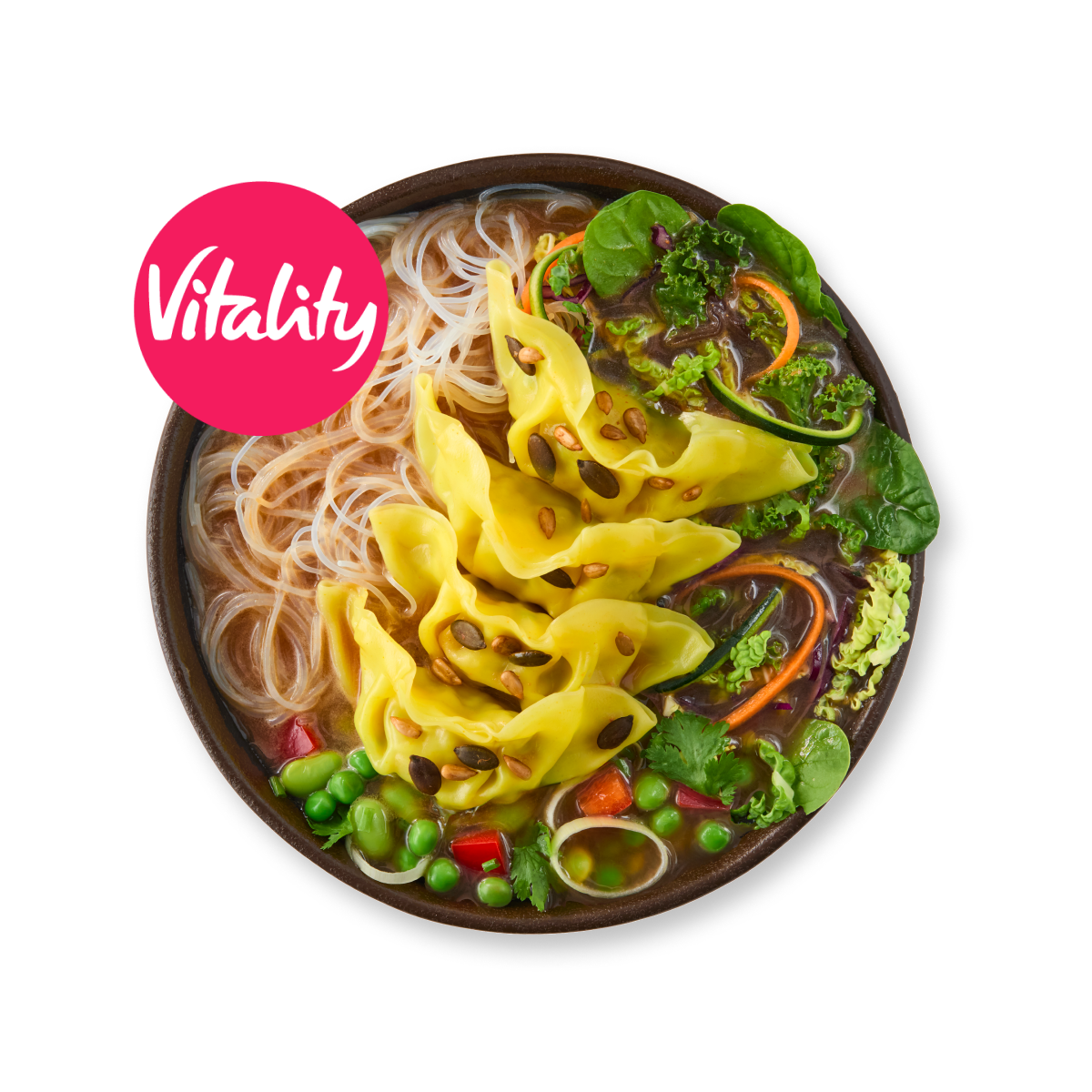 Bowl of noodle soup with tortellini, various vegetables, and seeds, featuring a 'Vitality' label.